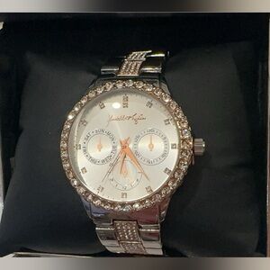 Kendall and Kylie new watch never worn/ tried on silver with a touch of pink!